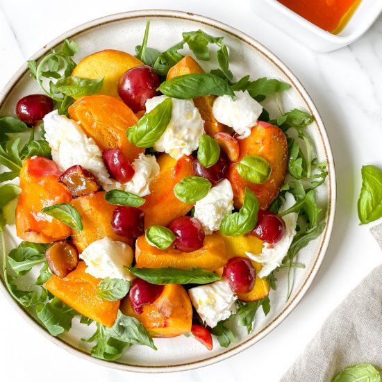 Baked stone fruit caprese salad