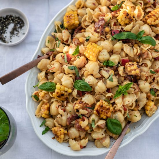 Pasta with corn, red pepper, bacon