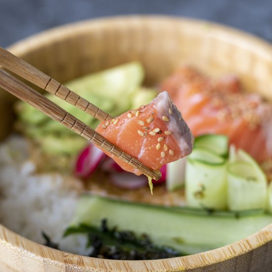 Salmon poke bowl with vegan mayo