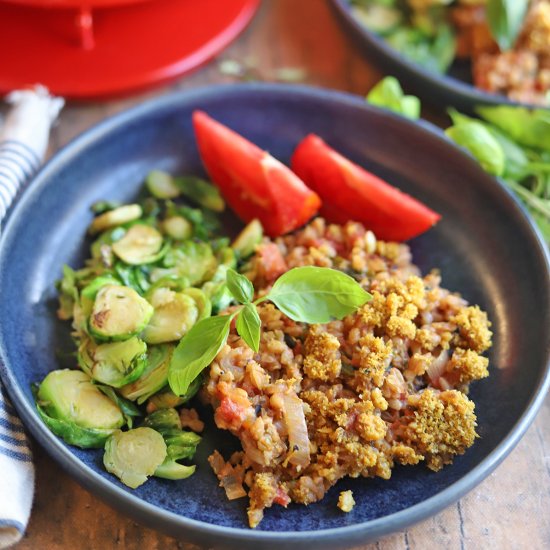 Baked farro with tomatoes and herbs