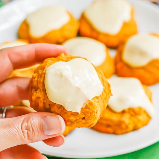 Pumpkin cookies with orange icing