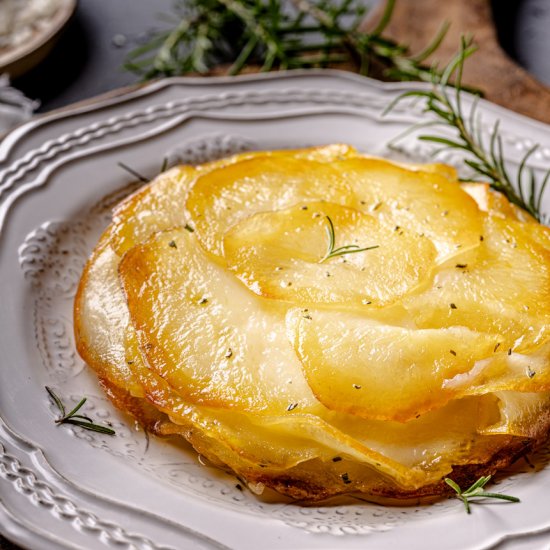 Cheesy Layered Rosemary Potatoes