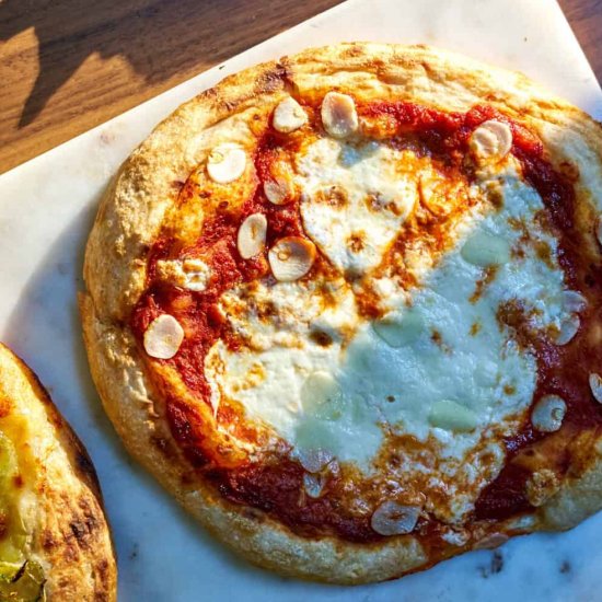 Marinara, Garlic, and Burrata Pizza