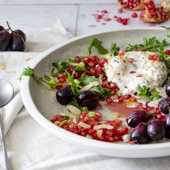 Warm grapes, burrata and pomgranate