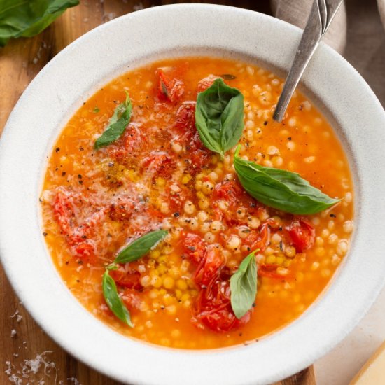 Burst Tomato Broth with Couscous