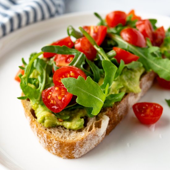 Tomato Avocado Toast with Arugula