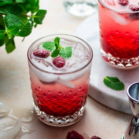 Raspberry rose gin fizz