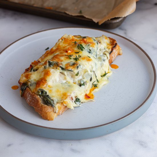 spinach artichoke toasts