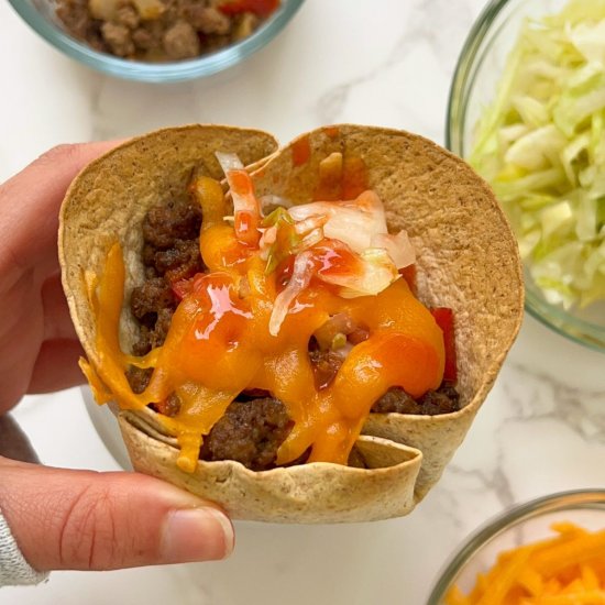 mini beef tacos in a tortilla cup