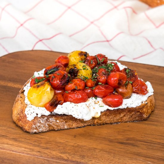 Roasted tomatoes and ricotta toast