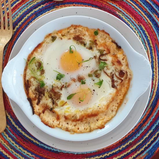 Baked eggs in mushroom sauce