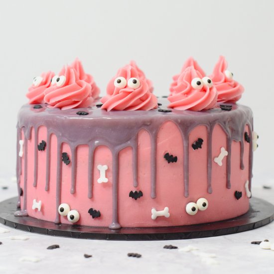 Pink Halloween Drip Cake