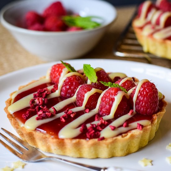 Raspberry and white chocolate tarts