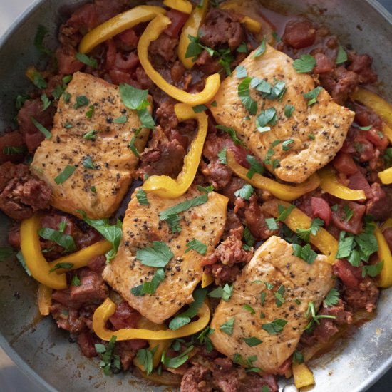 Salmon and chorizo in tomato sauce