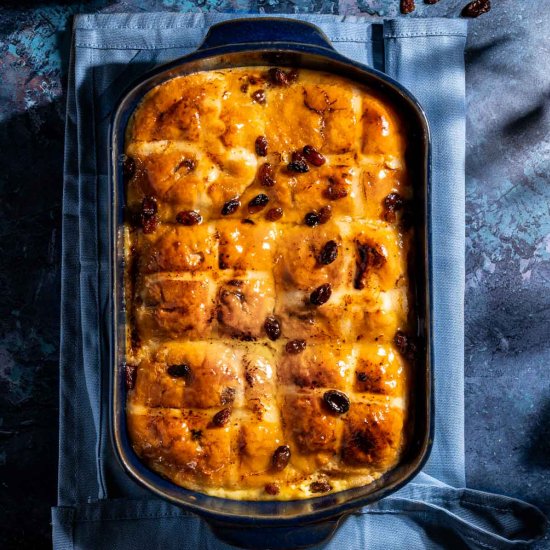 Hot cross bread and butter pudding