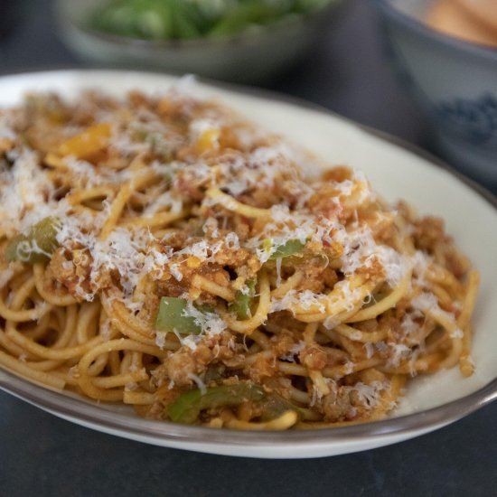 Tomato curry and chorizo pasta